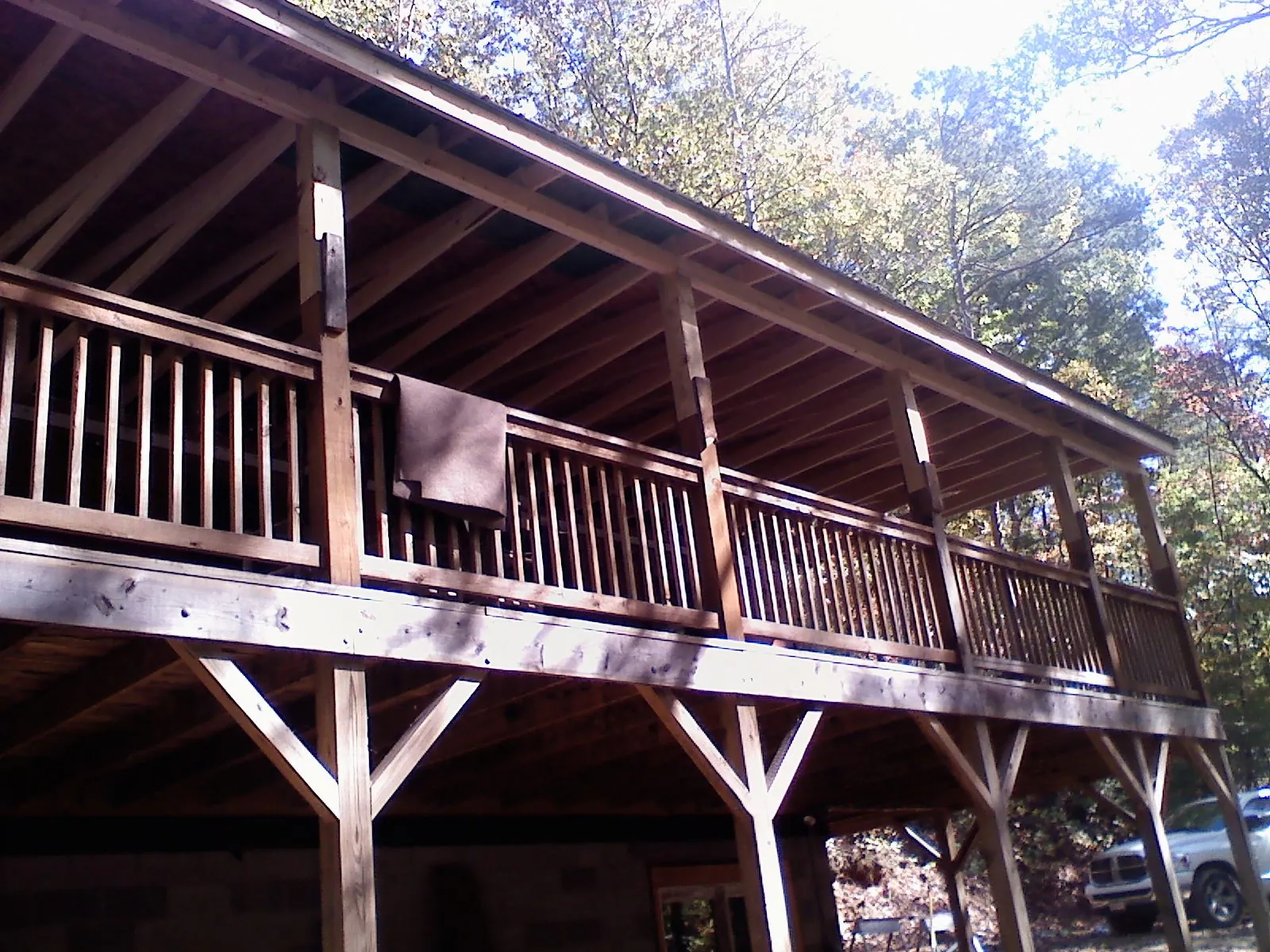 Timber framing under a new elevated porch and deck — Roof Leak Repair in Houma by Roofing Brothers